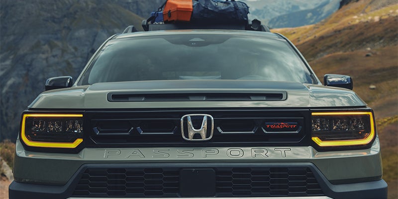 Honda Passport TrailSport equipped with overland roof rack in the mountains